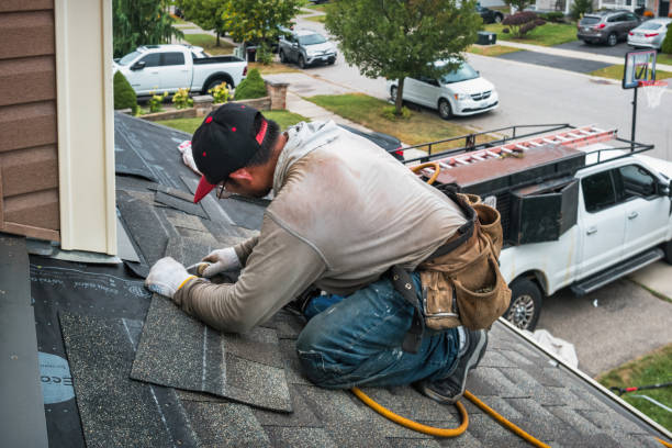 Professional Gutter Repair And Installation technician working in Fields, OR